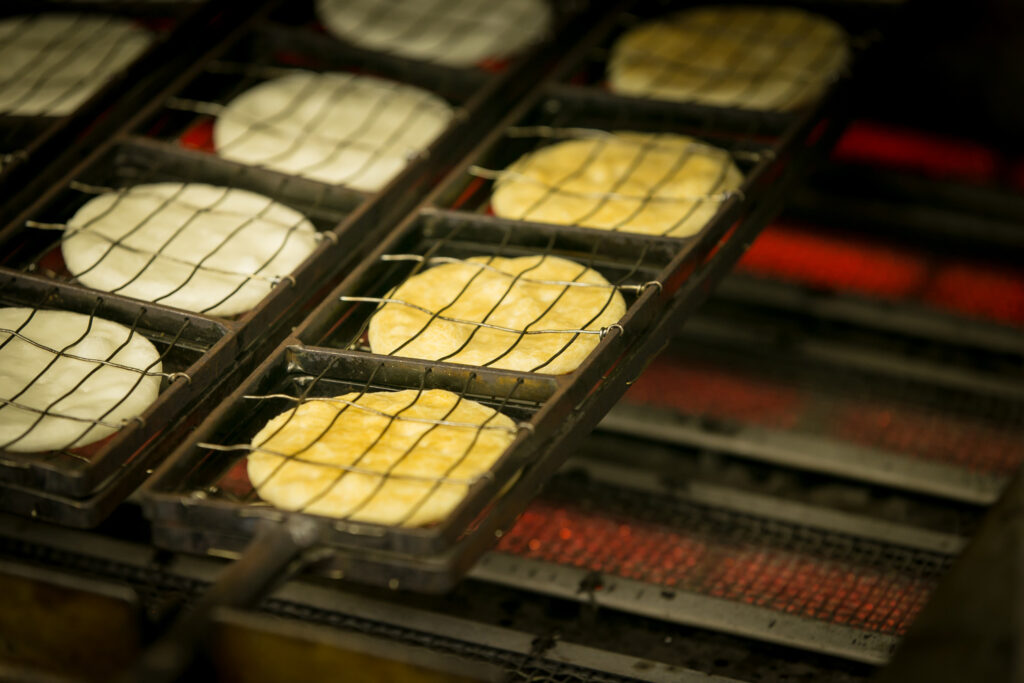 Rice crackers being baked