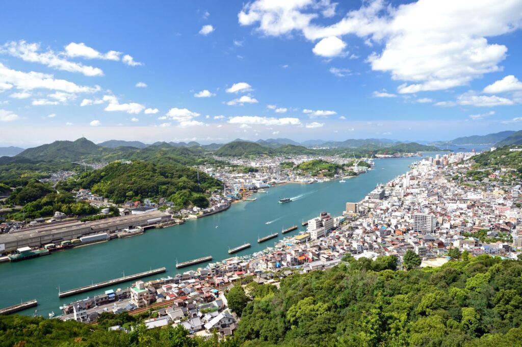 Onomichi, a commercial hub for maritime transport and industry, and also the starting point of the Shimanami Kaido cycling route.
