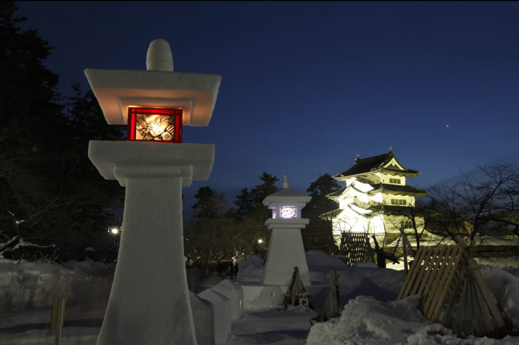 The sight of Hirosaki Castle seemingly floating amid the shimmering white landscape is an unforgettable experience for all who visit. | © JR East